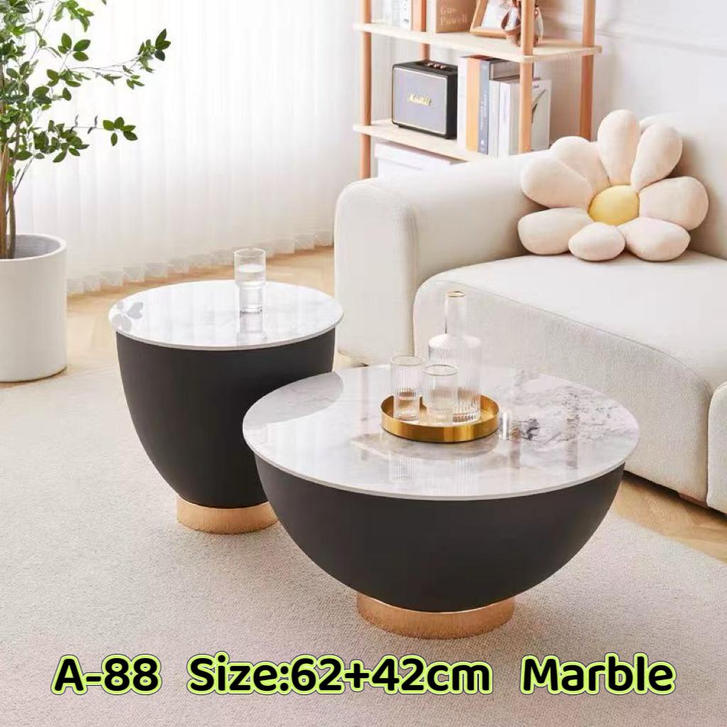  set of two round coffee tables,
