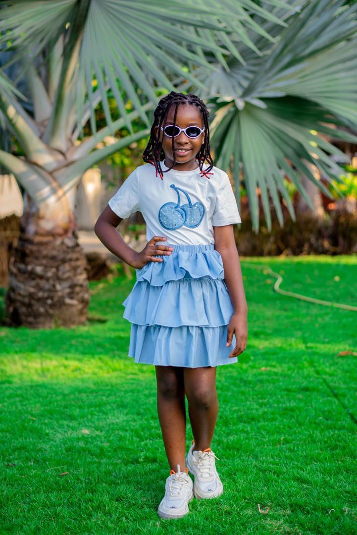  Korean-Style Simple Bow Shoulder Top And Versatile Popular Two-Piece Skirt Set". 