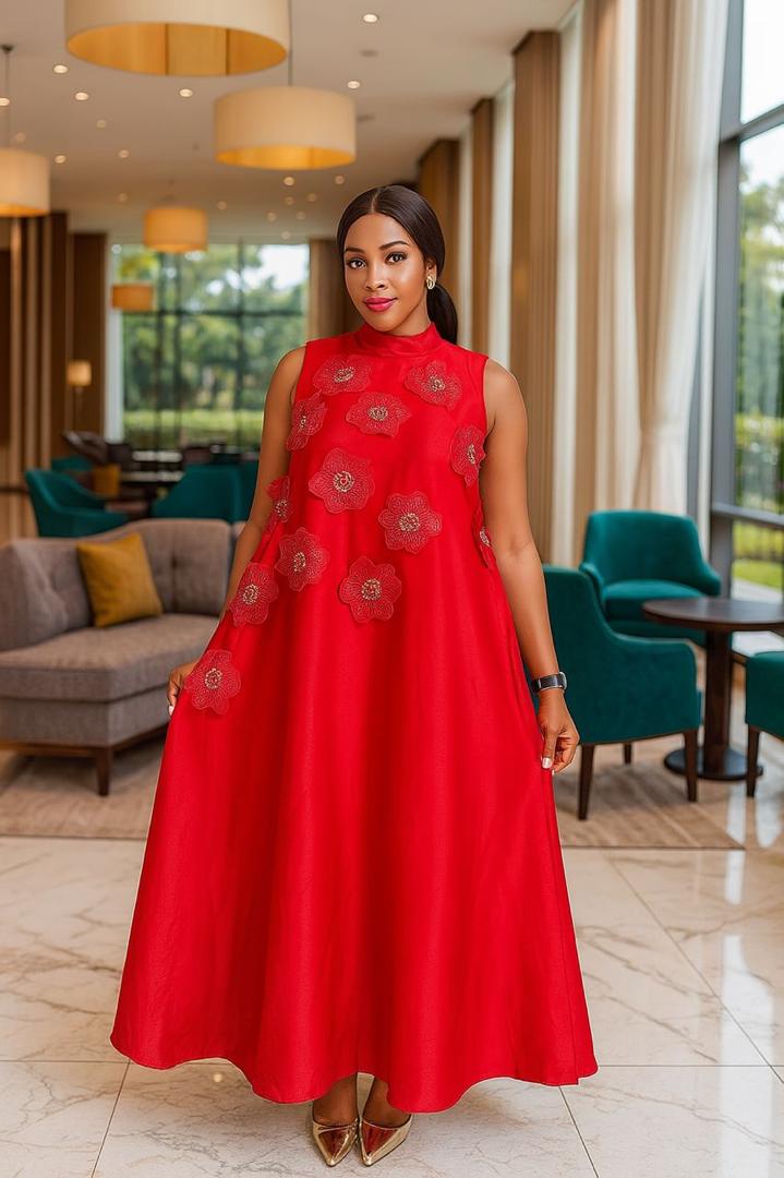 neckline, a sleeveless design, and floral appliques