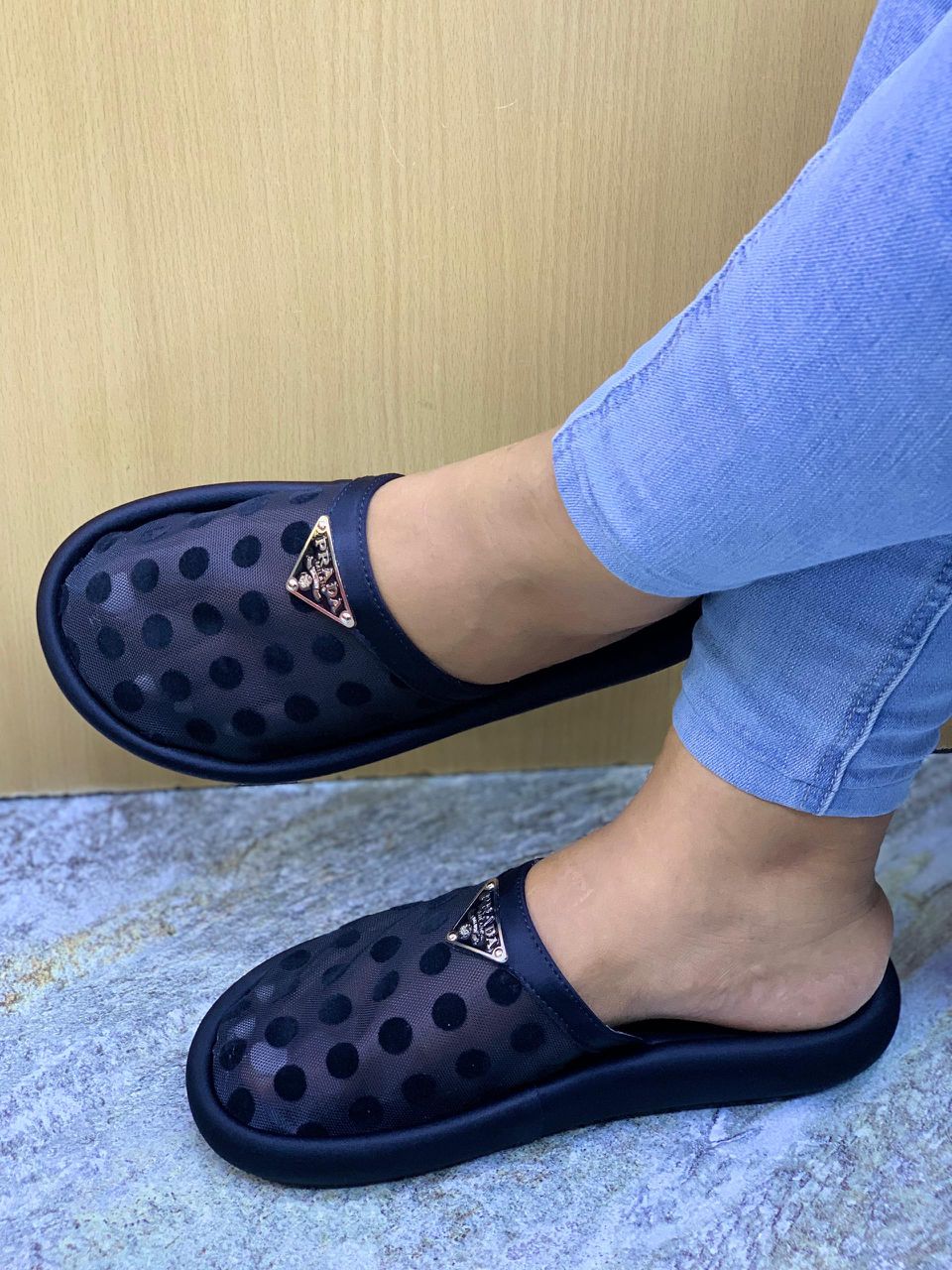  Prada slippers or flats. 